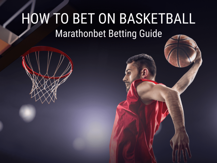 How to Bet on NBA Basketball cover A basketball player about to score a two-point field goal